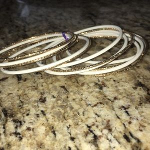 White and gold bracelets